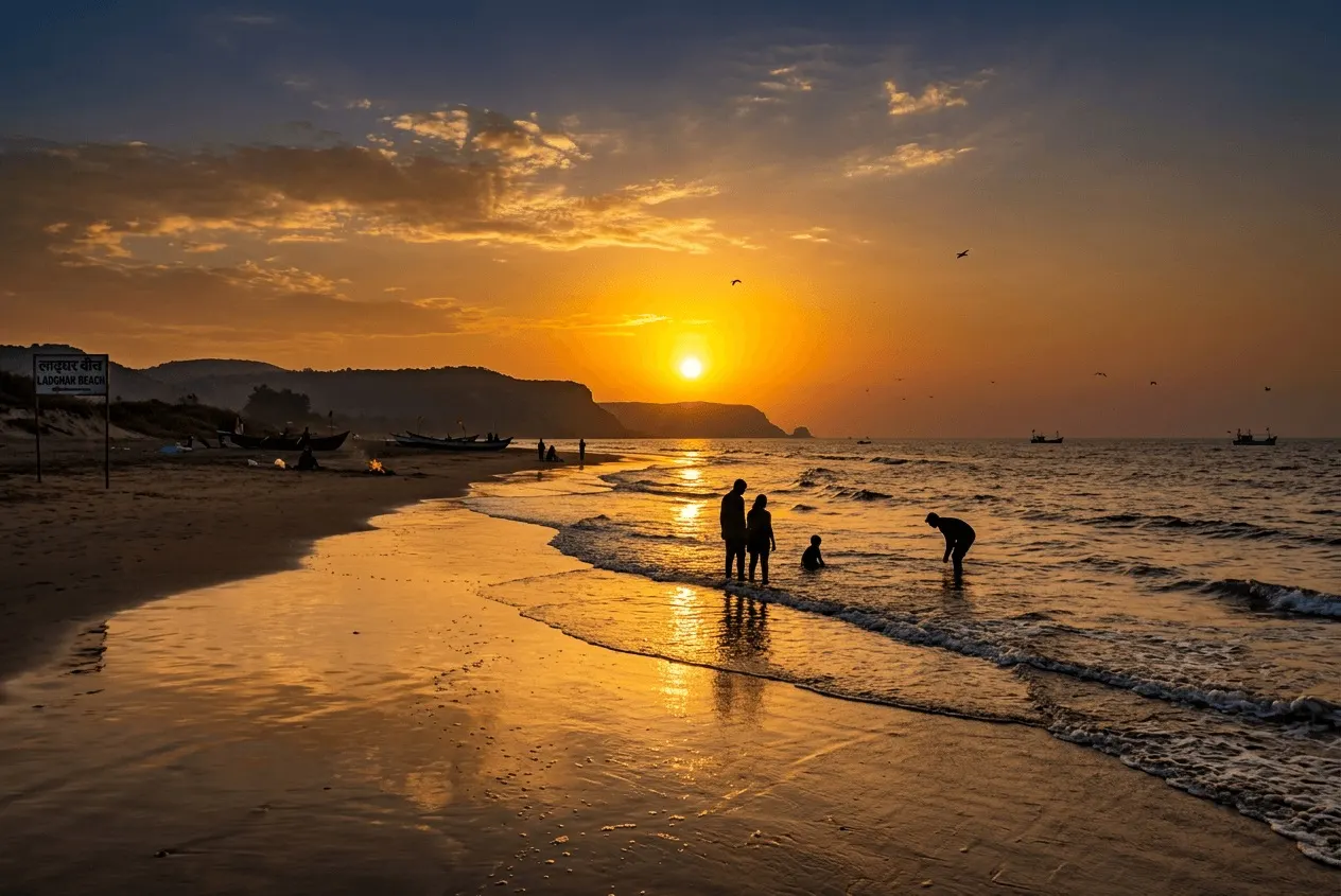 Families walking on Ladghar beach at golden-hour sunset